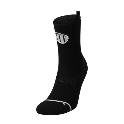 Black anti-slip grip socks by TRINITY, featuring a sleek design with dotted grip patterns for enhanced stability and comfort, perfect for various sports like running, football, padel, pilates and gym workouts.