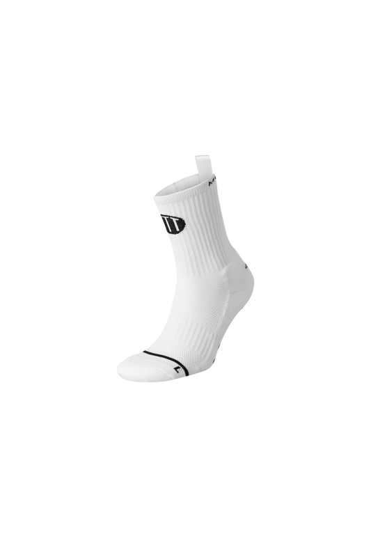 White anti-slip grip socks by TRINITY, featuring a sleek design with dotted grip patterns for enhanced stability and comfort, perfect for various sports like running, football, padel, pilates and gym workouts.