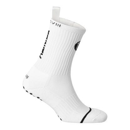 White anti-slip grip socks by TRINITY, featuring a sleek design with dotted grip patterns for enhanced stability and comfort, perfect for various sports like running, football, padel, pilates and gym workouts.