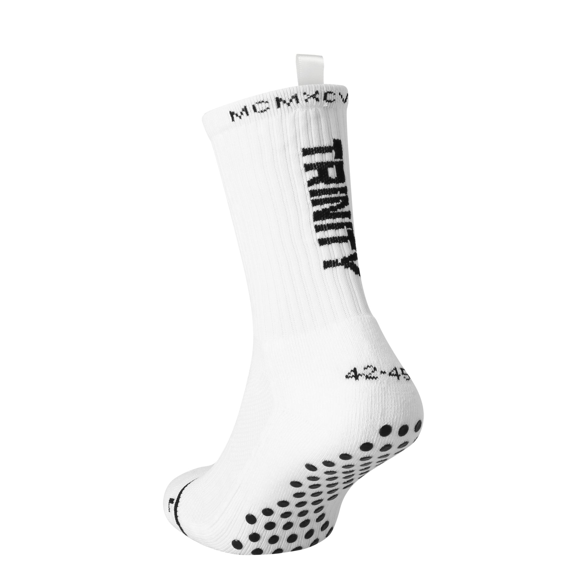 White anti-slip grip socks by TRINITY, featuring a sleek design with dotted grip patterns for enhanced stability and comfort, perfect for various sports like running, football, padel, pilates and gym workouts.